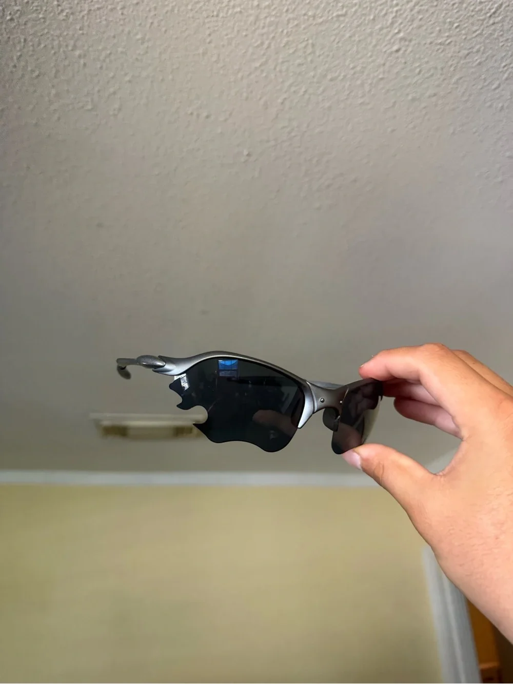 Sporty Flame-Style Sunglasses in Gunmetal with Dark Lenses Oakley